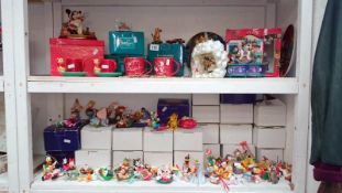 A large collection of Disney Christmas ornaments