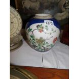 A fine hand painted ginger jar in deep blue,