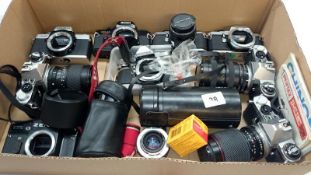 A quantity of 35mm camera's & lenses including Pentax, Minolta & Zenith etc.