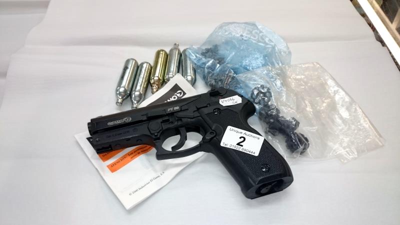 A Gamo PT80 gas compressor pistol & accessories