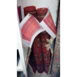 2 red patterned rugs, approx.