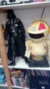 A tall figure of Darth Vader & a robot