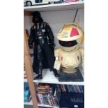 A tall figure of Darth Vader & a robot