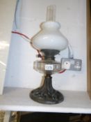 An art nouveau oil lamp with Hinks double burner