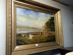 A large gilt framed oil on canvas of cattle