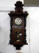 A Springer wall clock with key and pendulum