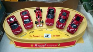 A shell garage Ferrari display stand and models