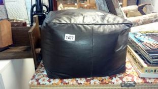 A leather pouffe