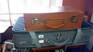 2 old suitcases