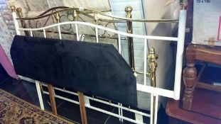 A brass bed frame & 1 other