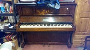 A piano made by Kent & Cooper Ltd, Lincoln