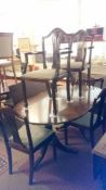 A mahognay table & 6 chairs