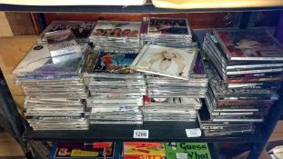 A shelf of CD's