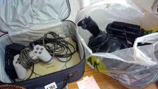 A Sony Play station & controllers etc.