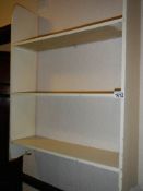 A set of pine hanging shelves