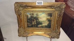 A gilt frame picture