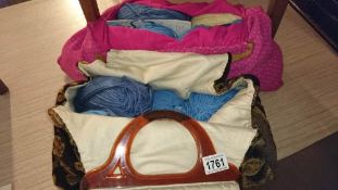 A carpet bag & 1 other bag of knitting items