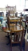 An oak retro style table & 4 chairs