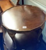 A round Queen Ann leg table