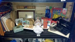 A quantity of miscellaneous items including table mats etc.