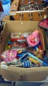 A box of new child's toys etc.