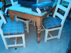 An old pine table and 4 chairs