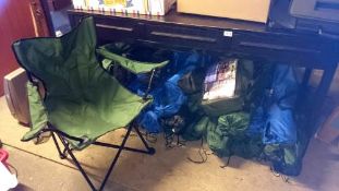 A large quantity of folding camping chairs etc.