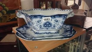 A Victorian blue & white tureen & 2 plates
