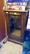 An oak glazed door & 1 drawer cabinet