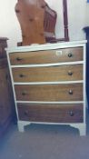 A 4 drawer bow front chest of drawers