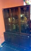 A mahogany glazed top bookcase