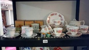 A shelf of tea ware etc.