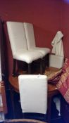 A set of 4 dining chairs