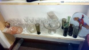 A shelf of glasses