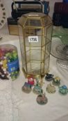 A glass brass display cabinet & 9 teapots etc.