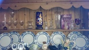 A shelf of glassware