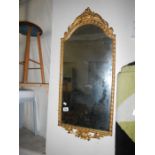 An old metal framed mirror
