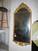 An old metal framed mirror