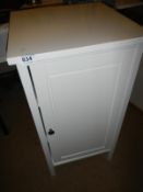 A white single door pot cupboard