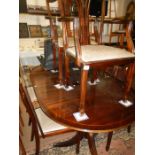 A mahogany dining table and 6 chairs