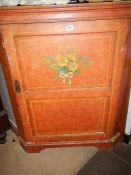 An old painted corner cupboard