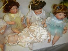 A quantity of dolls