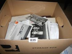 A box of old photographs etc