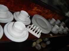 2 tea sets and dinner plates