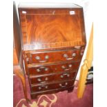 A 4 drawer mahogany desk