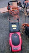 A Champion electric mower
