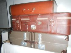 3 old suitcases