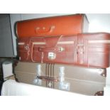 3 old suitcases