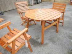 A garden table and 3 chairs