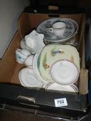 A box of old china